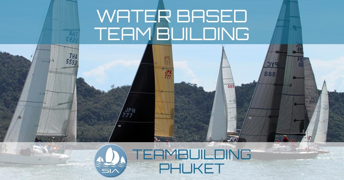 water based teambuilding sailing regatta event with yachts lining up at start line